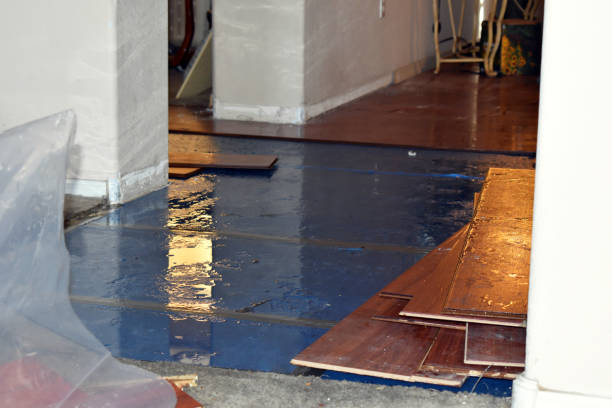 Professional Flood Damage Restoration technician working in Waupun, WI
